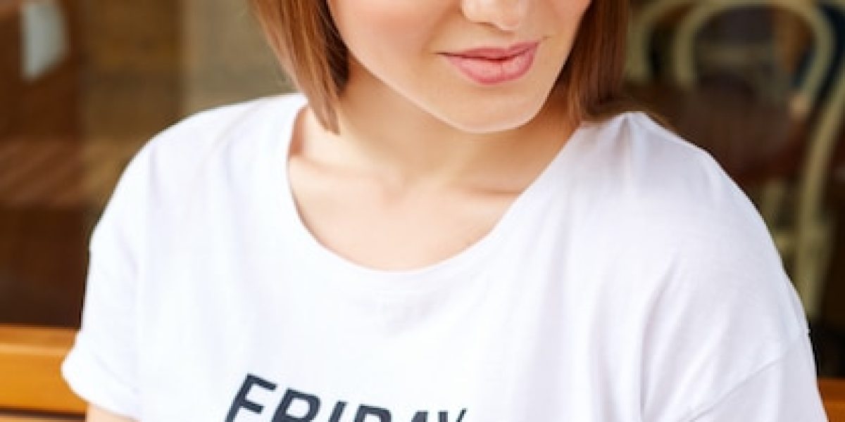 freepicdownloader.com-portrait-woman-sitting-bench-normal