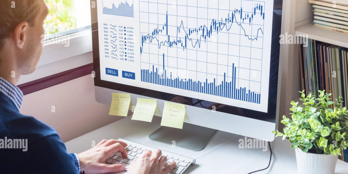 home-trader-analyzing-forex-foreign-exchange-trading-charts-and-buy-sell-buttons-on-computer-screen-stock-market-investment-financial-technology-MERGX2